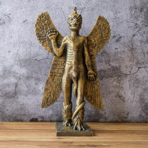 Pazuzu statue standing on a wooden table